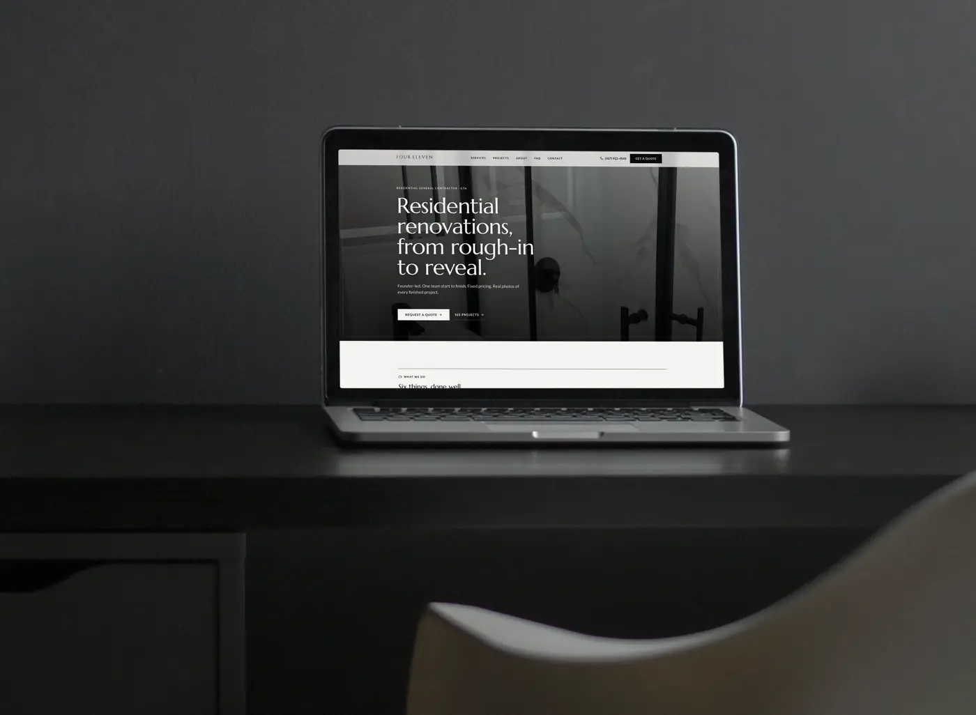 The Four Eleven Contracting website Fervor built, shown on a MacBook
