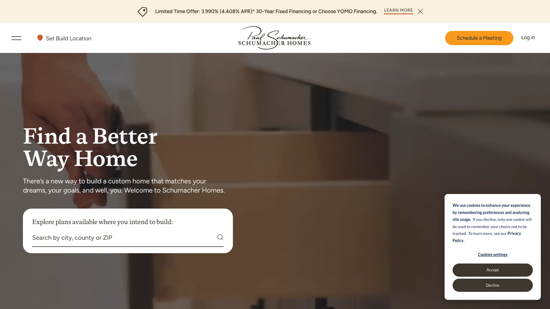 Schumacher Homes homepage hero showing custom home building branding