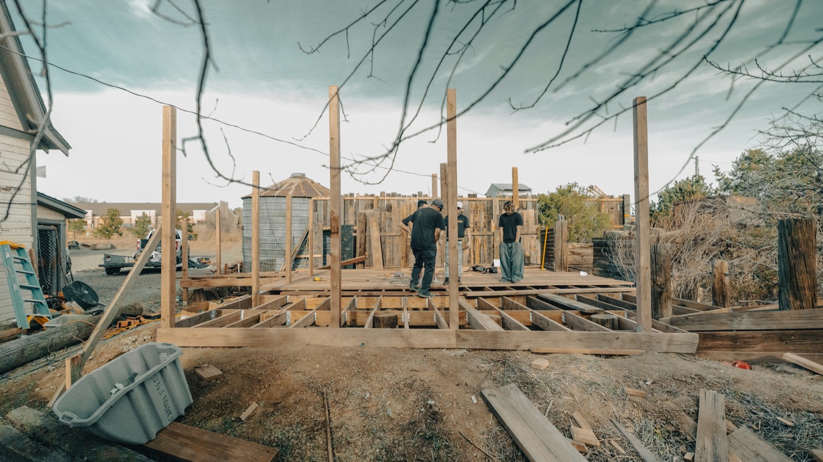 Custom home builder framing a house on a jobsite